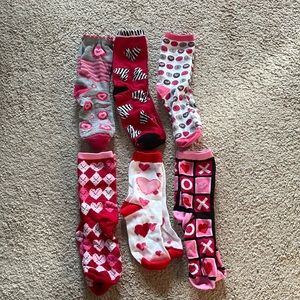 Variety of holiday socks🎅🏼🎄💐🌷🌹❤️🐣